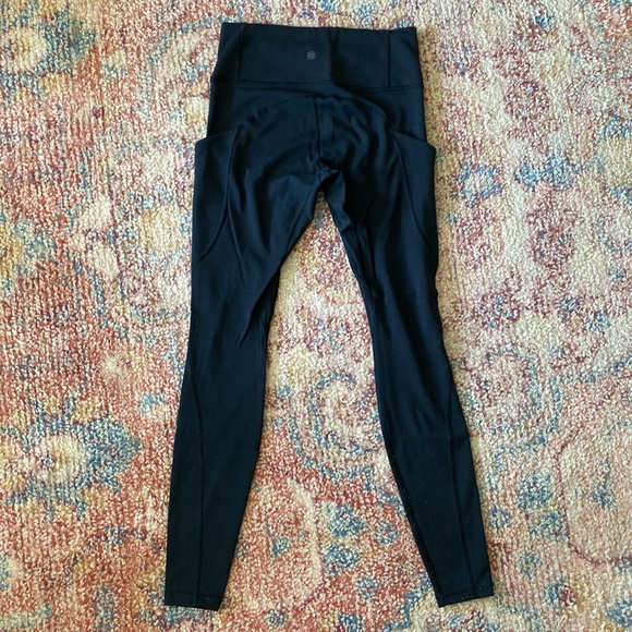 Athleta Black leggings with pockets - Picture 2 of 5